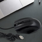 A black wired optical mouse from Compshop with its USB cable clearly visible.