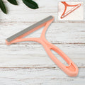 Ergonomic portable lint remover for clothes and furniture.
