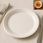 30 cm round dinner plate with glossy white finish on table