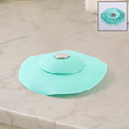 Light green silicone sink strainer and seal cover preventing kitchen clogs