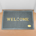A stylish Welcome Door Mat in a neutral tone, designed for Indian home entrances.