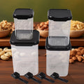 Set of 4 air tight plastic food storage containers with spoon and white lids