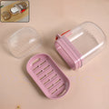 Plastic soap dish with transparent dust-proof lid and pink base showing multipurpose design