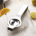 Stainless steel lemon press with ergonomic handle for easy juice extraction