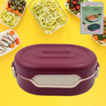 Airtight Tiffin Box with two compartments and integrated spoon.