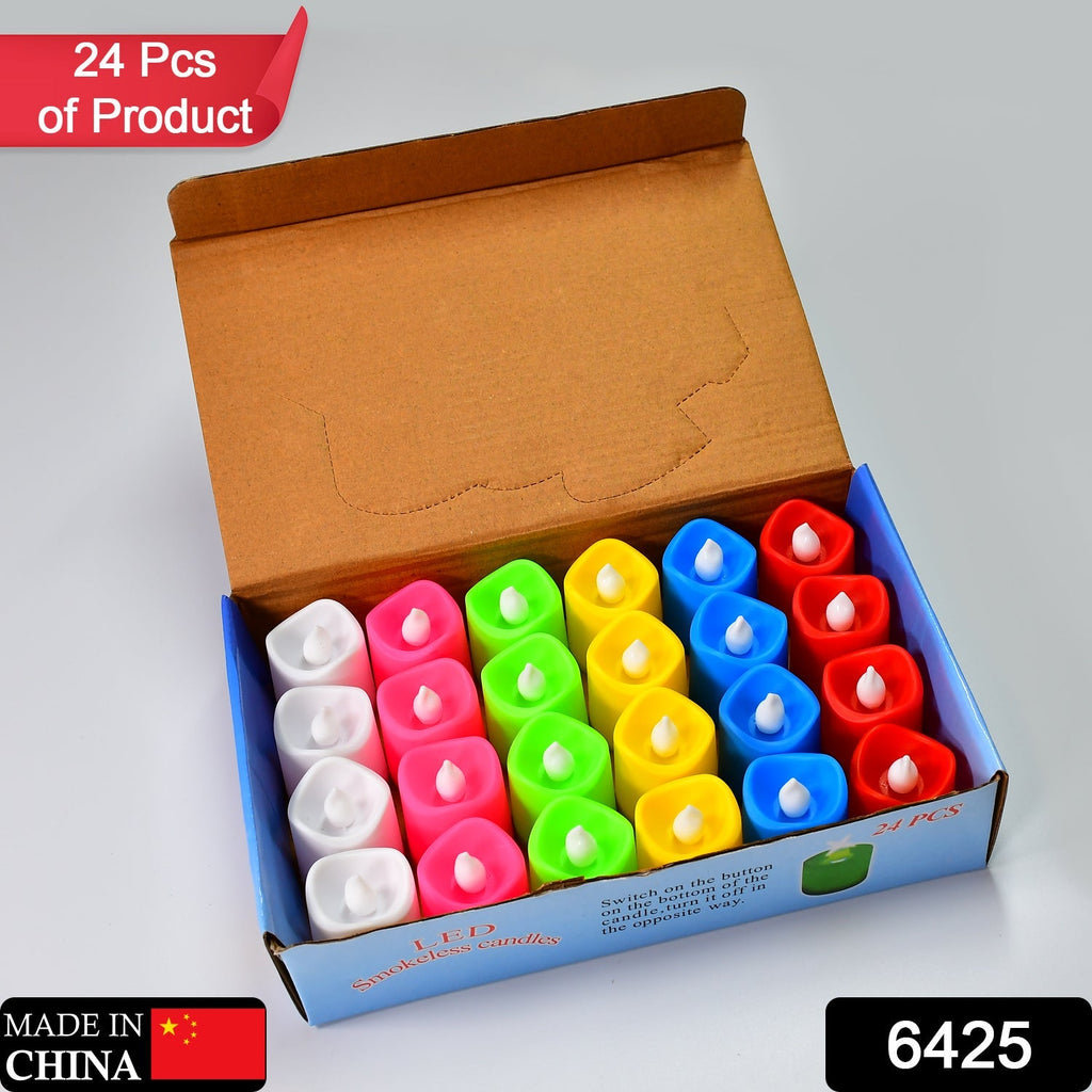 A close-up of several flameless LED tea lights glowing in various colors.