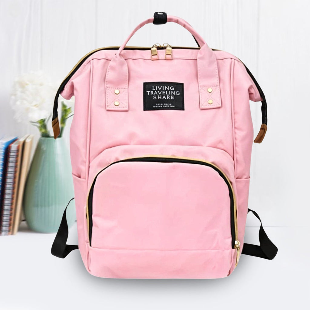 Side view of the spacious Tots Basics Diaper Bag Backpack.