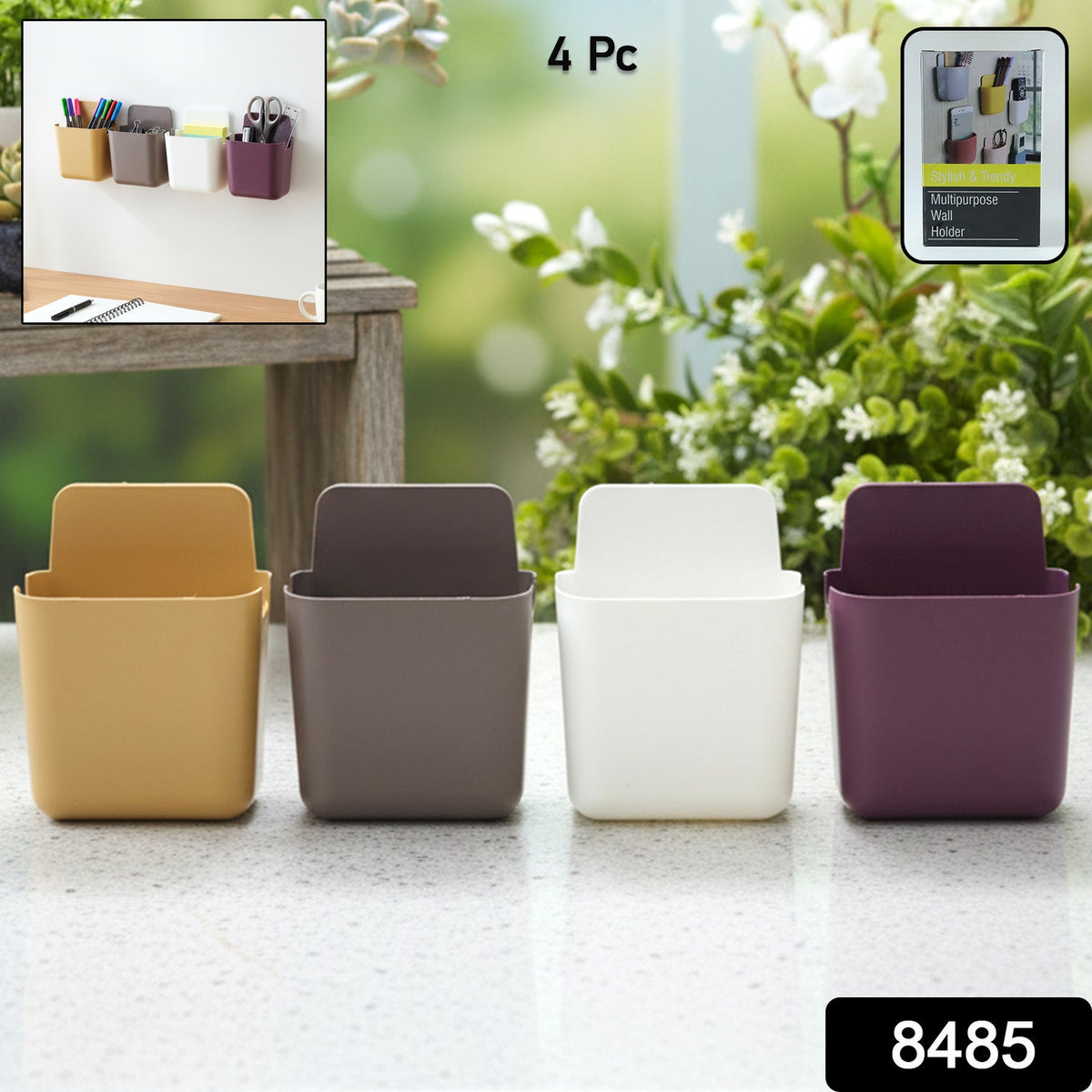 Four mixed-colour Wall Mounted Mobile Holders on a smooth, clean wall surface.
