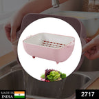 Ergonomic double-layered strainer with handles, ideal for kitchen tasks.
