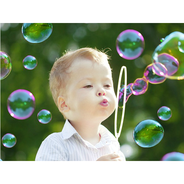 Clear bottle of Bubble Gun Liquid Refill, showing transparent bubble solution.