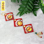 Traditional Labh Shubh wall hanging with vibrant colors and golden embellishments