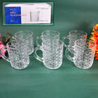 Set of six clear glass coffee mugs with handles, showcasing their elegant design.