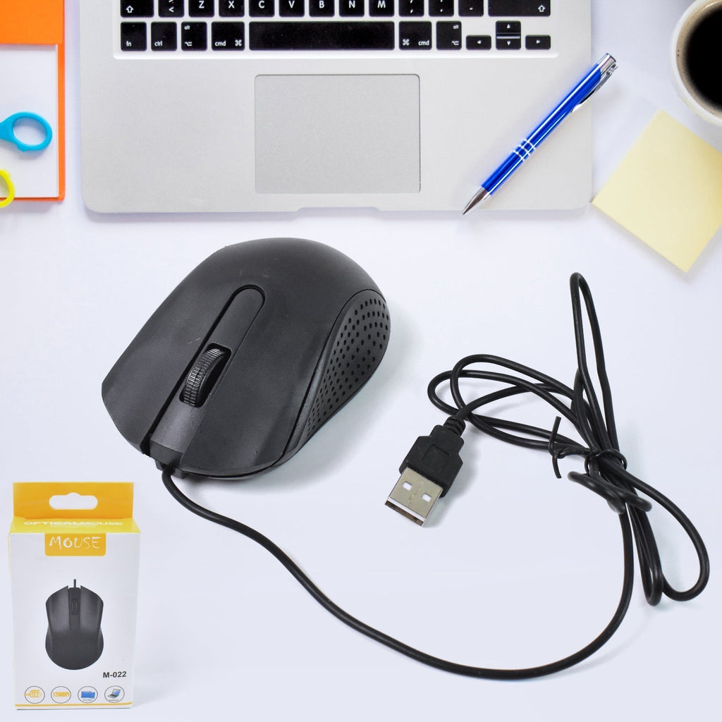 Black Compshop Wired Optical Mouse M-022 with USB cable on a desk.