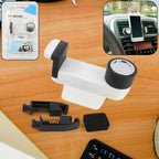 White 180 degree rotating car phone holder mounted on ventilation blade