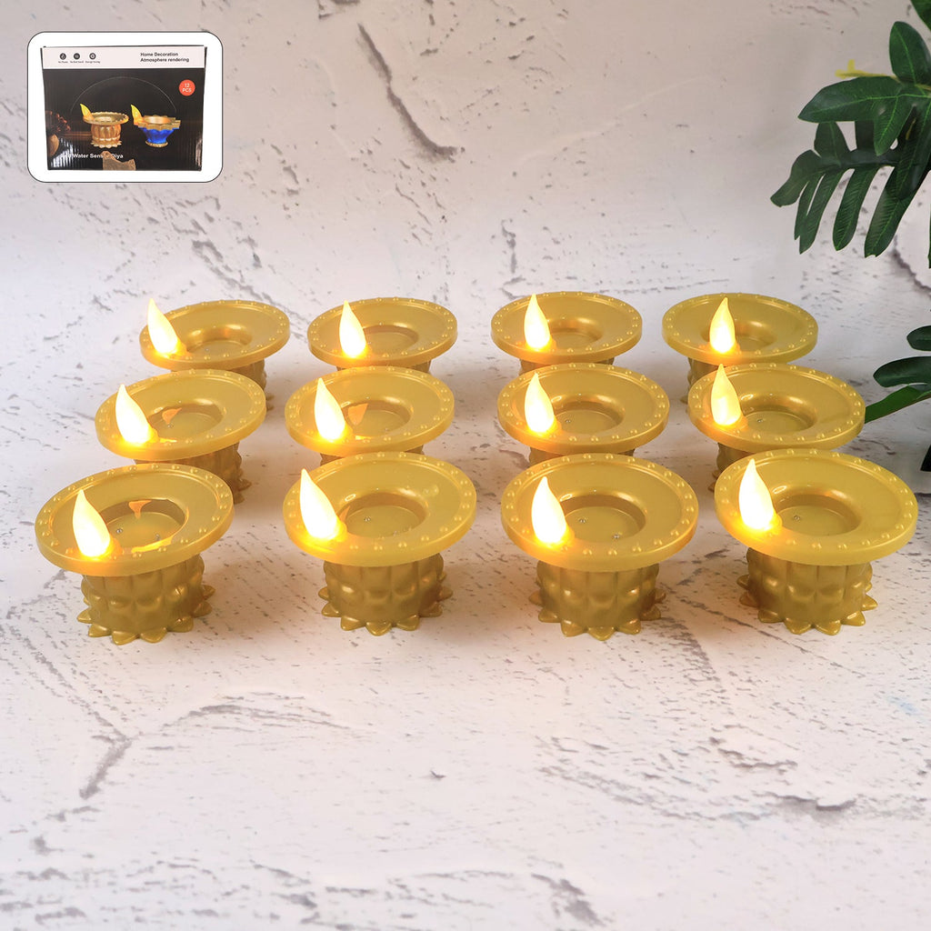 Set of 12 water sensor LED golden diyas glowing softly