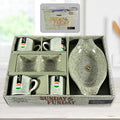 A complete six-piece Ceramic Snack & Tea Set from Serve Stellar, featuring four ceramic cups, a snack platter, and a two-compartment chutney bowl.