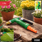 Water spray gun held in hand, showing its compact size and comfortable grip.