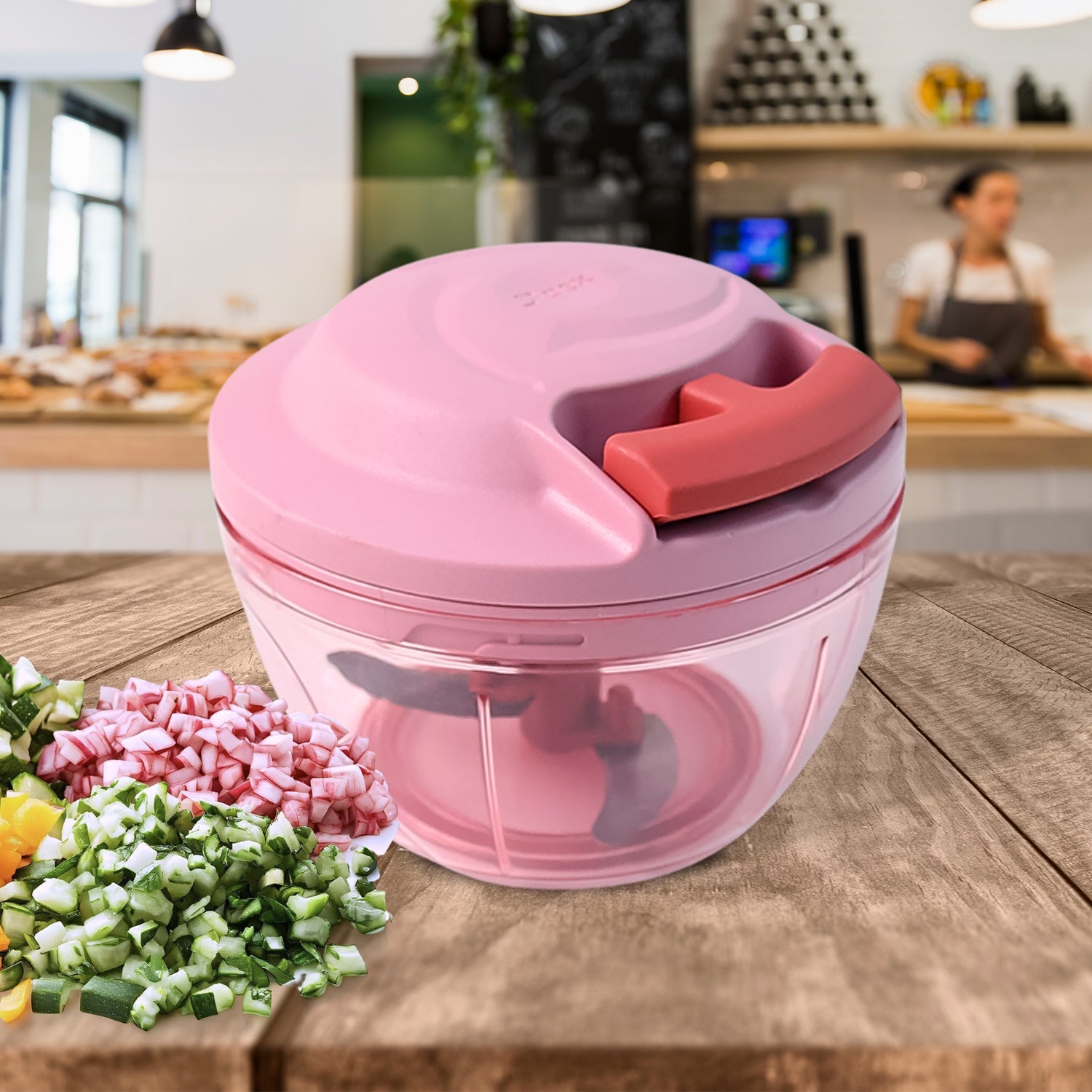 Hand-pull vegetable chopper showing triple stainless steel blades and 500ml container