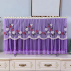 Stylish mix-color dustproof TV cover draped over a television in a home setting.