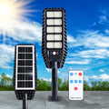 Solar LED street light with high-powered LED array, motion sensor, and remote control for outdoor use