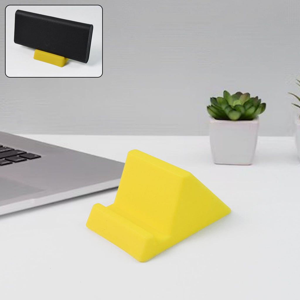 Compact plastic mobile phone holder stand angled for stable smartphone support on desk