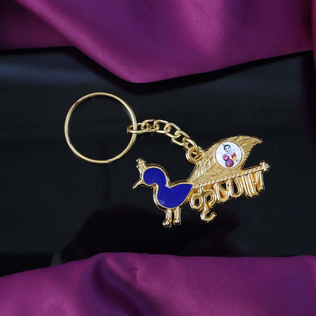 Krishna Peacock Metal Keychain with gold-tone finish and vibrant enamel peacock design