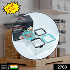 Transparent 700ml square containers with blue lids, neatly arranged for kitchen organisation.