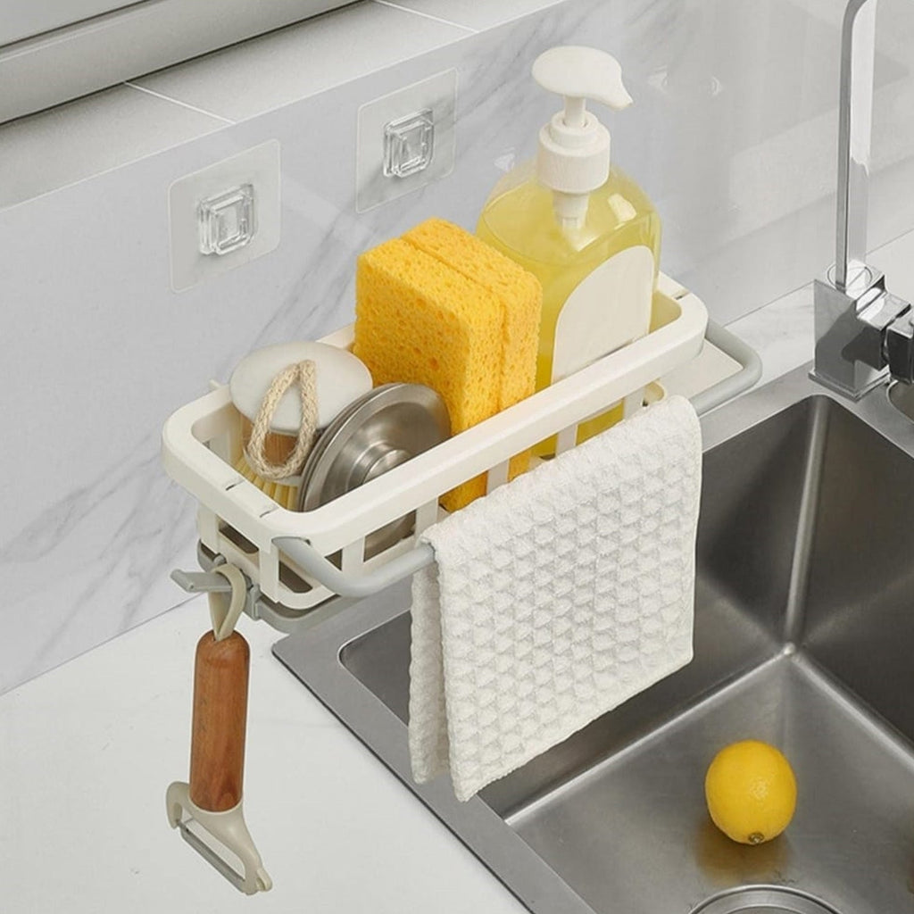 Side view of the Bathora kitchen sink organizer, showcasing its retractable design and drainage holes.