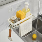 Side view of the Bathora kitchen sink organizer, showcasing its retractable design and drainage holes.