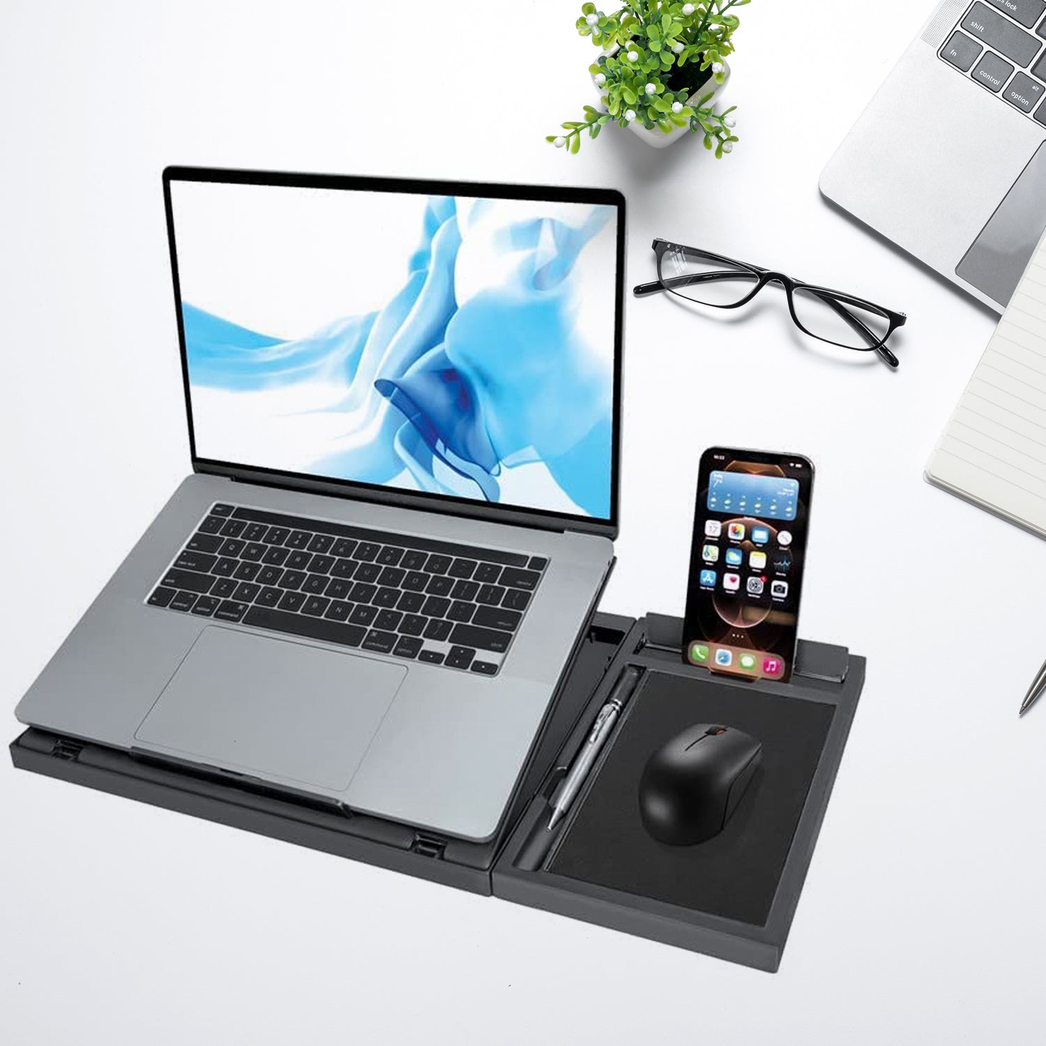 Ergonomic foldable laptop stand with free phone holder for MacBook and tablets.