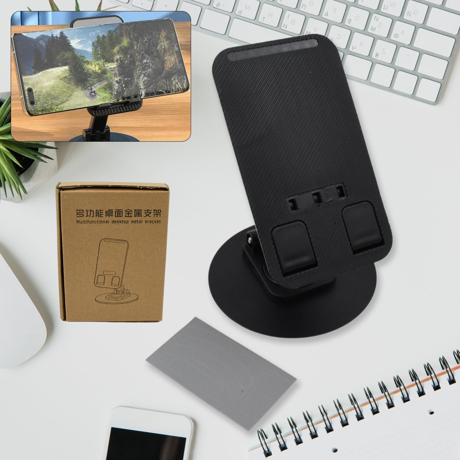 A sleek black rotating mobile stand, folded compactly on a desk, ready for use.