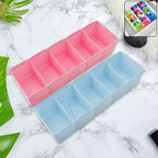 Pack of two 5-compartment drawer organizers for socks and undergarments.