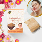 Woman applying Multani Mitti Face Pack for deep cleansing and oil control.
