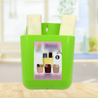 GlimmerHome 2-section wall holder neatly organizing a mobile phone and remote.
