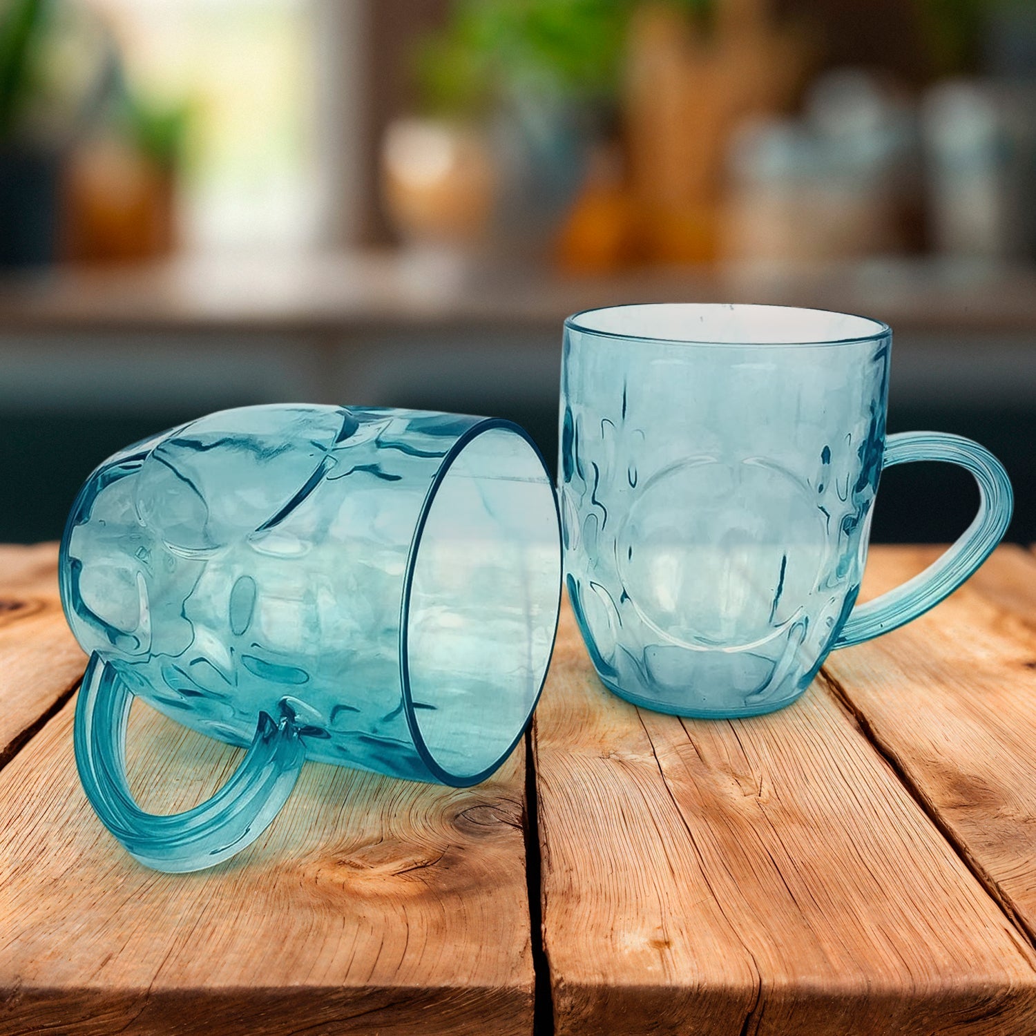 Two unused Apex plastic shake mugs with textured grip side by side