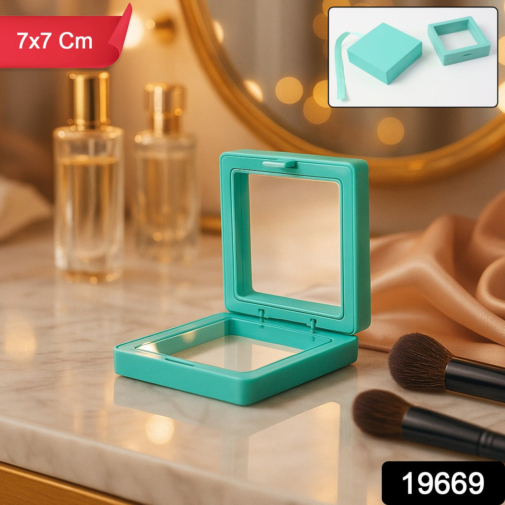 Close-up of jewellery secured inside transparent floating display box