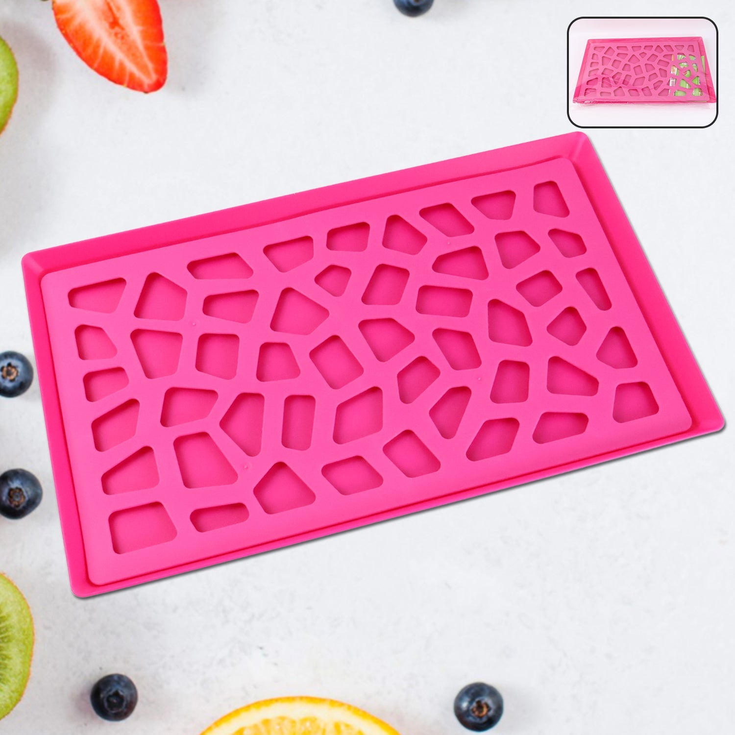 Lightweight plastic serving tray with hollow geometric design on countertop