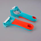 Deluxe 4-in-1 vegetable peeler featuring straight, serrated, and julienne blades