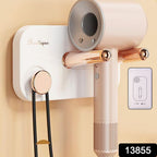 Wall mounted hair dryer holder holding a hair dryer