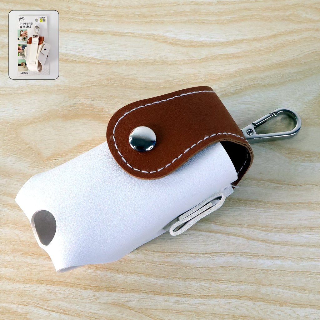 Front view of compact golf tees holder and mini ball pouch