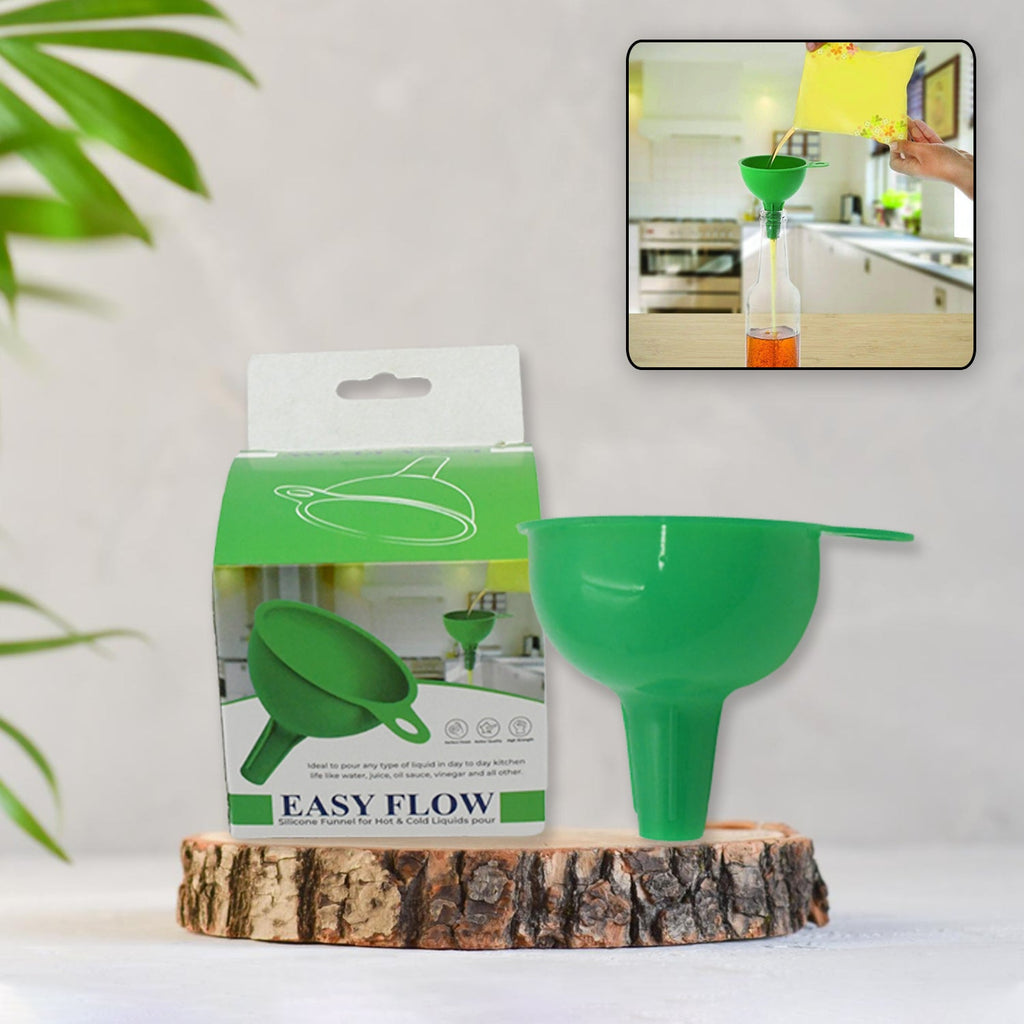 Close-up of a green silicone funnel, ideal for pouring oil or juice.