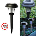 Garden Vera solar mosquito trap and garden light illuminating an outdoor space.