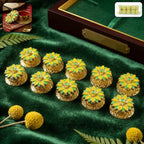 Decorative kumkum storage box with floral design for pooja rituals