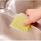 Ergonomic scratch-proof scrubber pad, ideal for gentle cleaning.