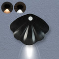 Shell-shaped motion sensor night light emitting soft glow