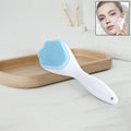AuriGlam Silicone Face Scrubber in black, showing soft bristles and ergonomic design.