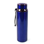 Stainless steel water bottle on table with drink inside