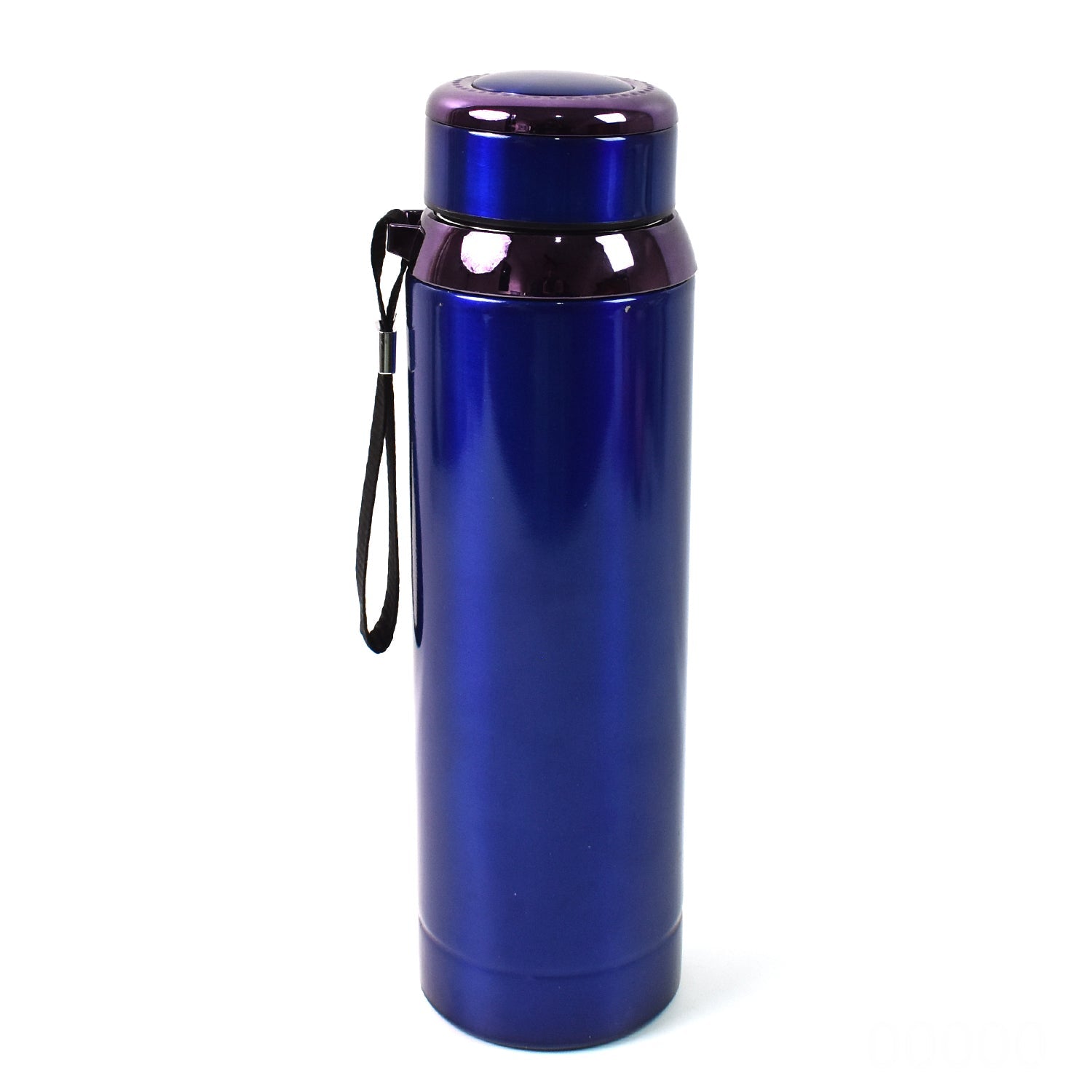 Stainless steel water bottle on table with drink inside