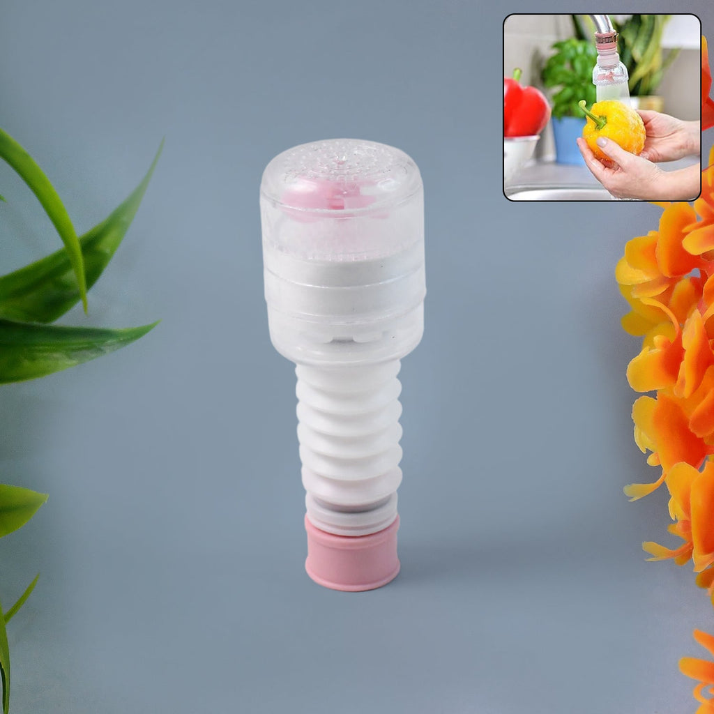 Flexible faucet extender attached to kitchen sink faucet directing water flow