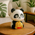 Solar panda car decor with moving head on a white background, ready for a dashboard.